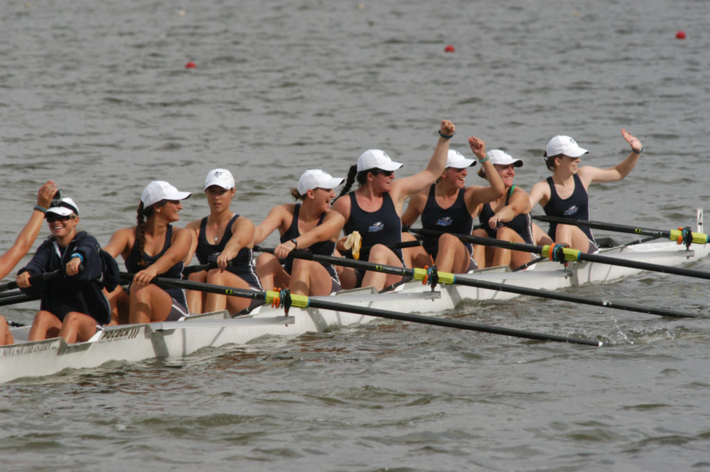 An image of the women of the Nova Southeastern varsity eight [Lauren Boudreau, Tori Torrisi, Stephanie Hauck, Amanda Craig, Taylor Van Horn, Kelly Scott, Sarah Patterson, Camille Evans, and Amanda Hudon] at the 2013 NCAA Women's Rowing Championships. The Sharks secured the program's first NCAA title at the event, winning both the Division II women's eight and four.